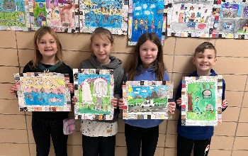 students with their artwork